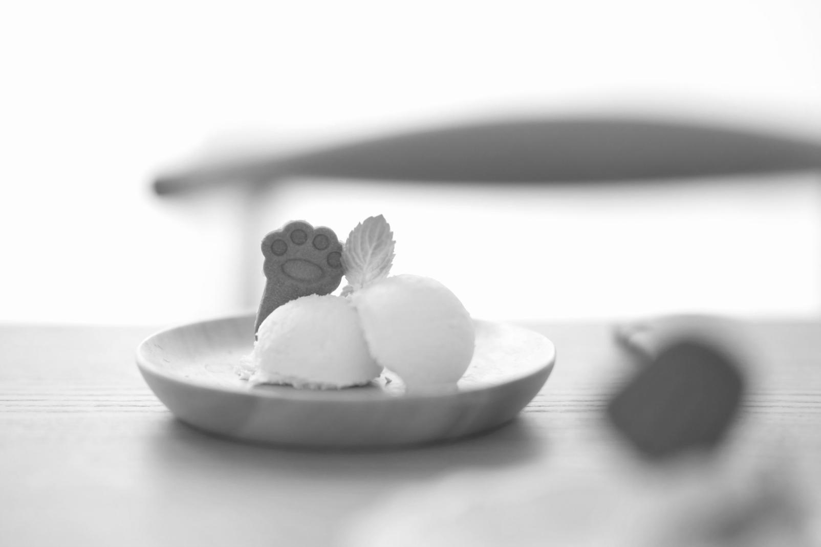 Hands chopping fresh vegetables on wooden cutting board with colorful produce