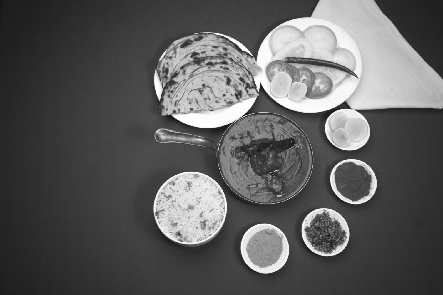 Hands preparing fresh ingredients on a kitchen counter