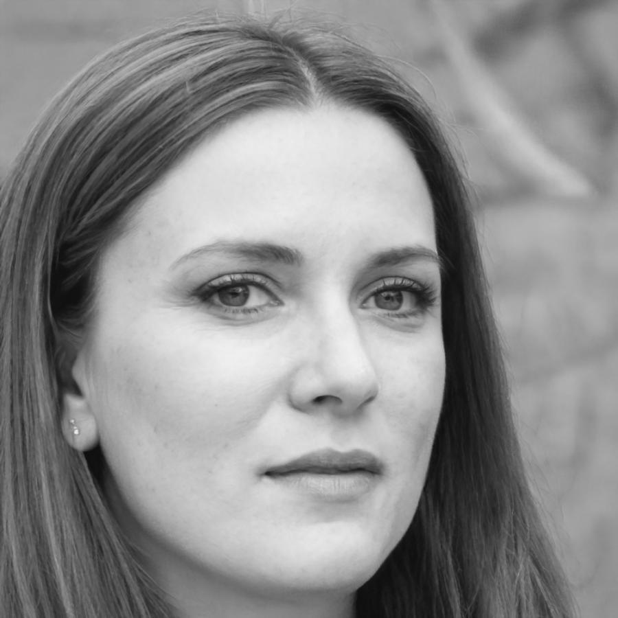 Person reviewing cooking notes and recipes